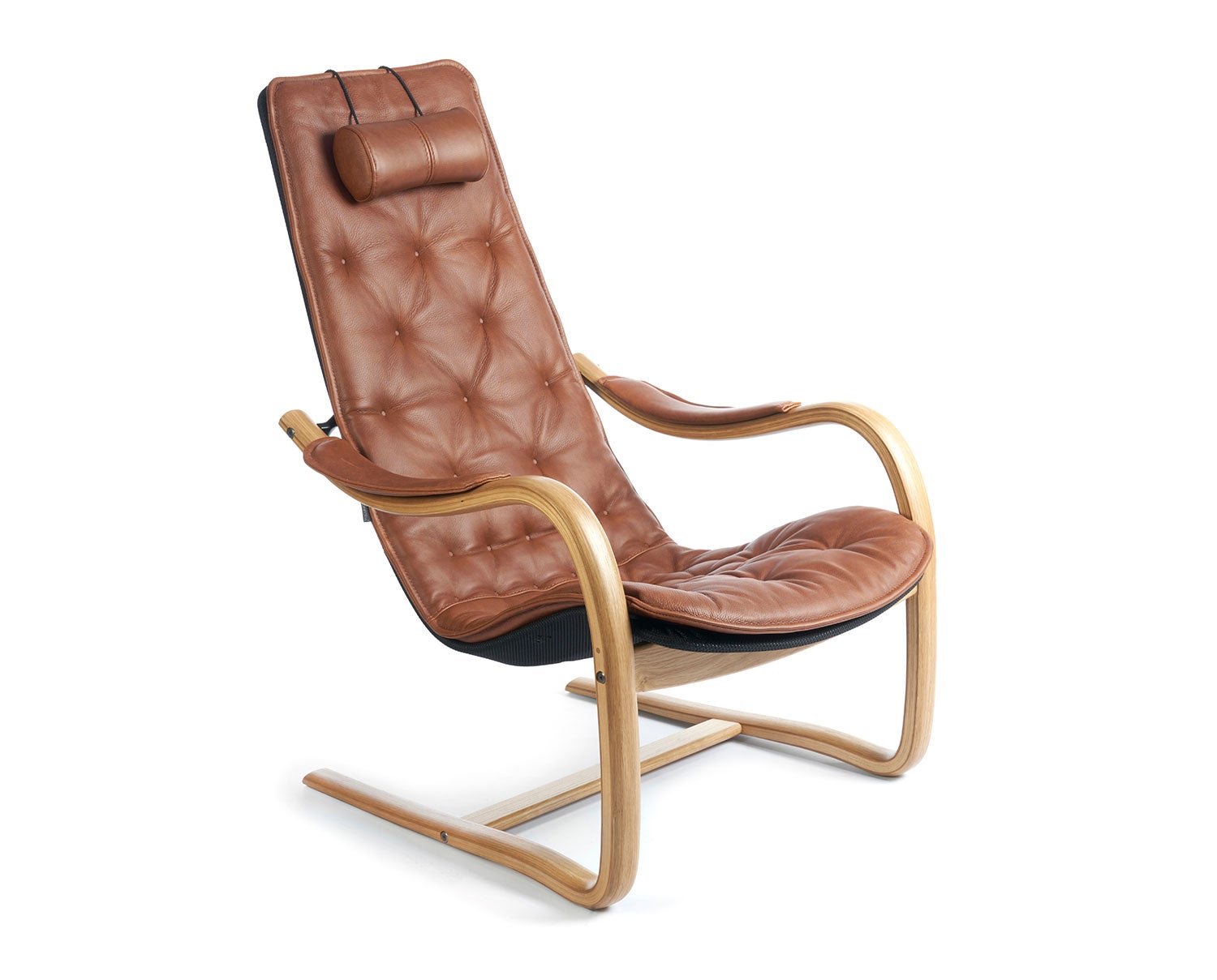 Conform Bravo fåtölj med svikt i färgen Cognac.