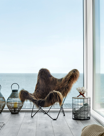 Iceland Mariposa Wild Brown Fårskinnsfåtölj med Svartaben