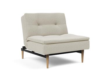 Dublexo fåtölj med ljusa stylettoben i tyget 527 Mixed Dance Natural