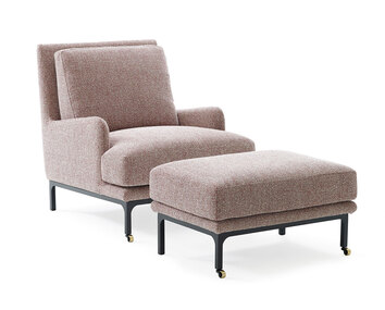 Fotpallen Mr. Jones, visad med fåtöljen Mr. Jones, klädd i tyget Bohemian 090. 