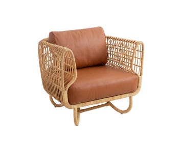 Nest loungechair in natural rattan with cognac leather from Cane-line