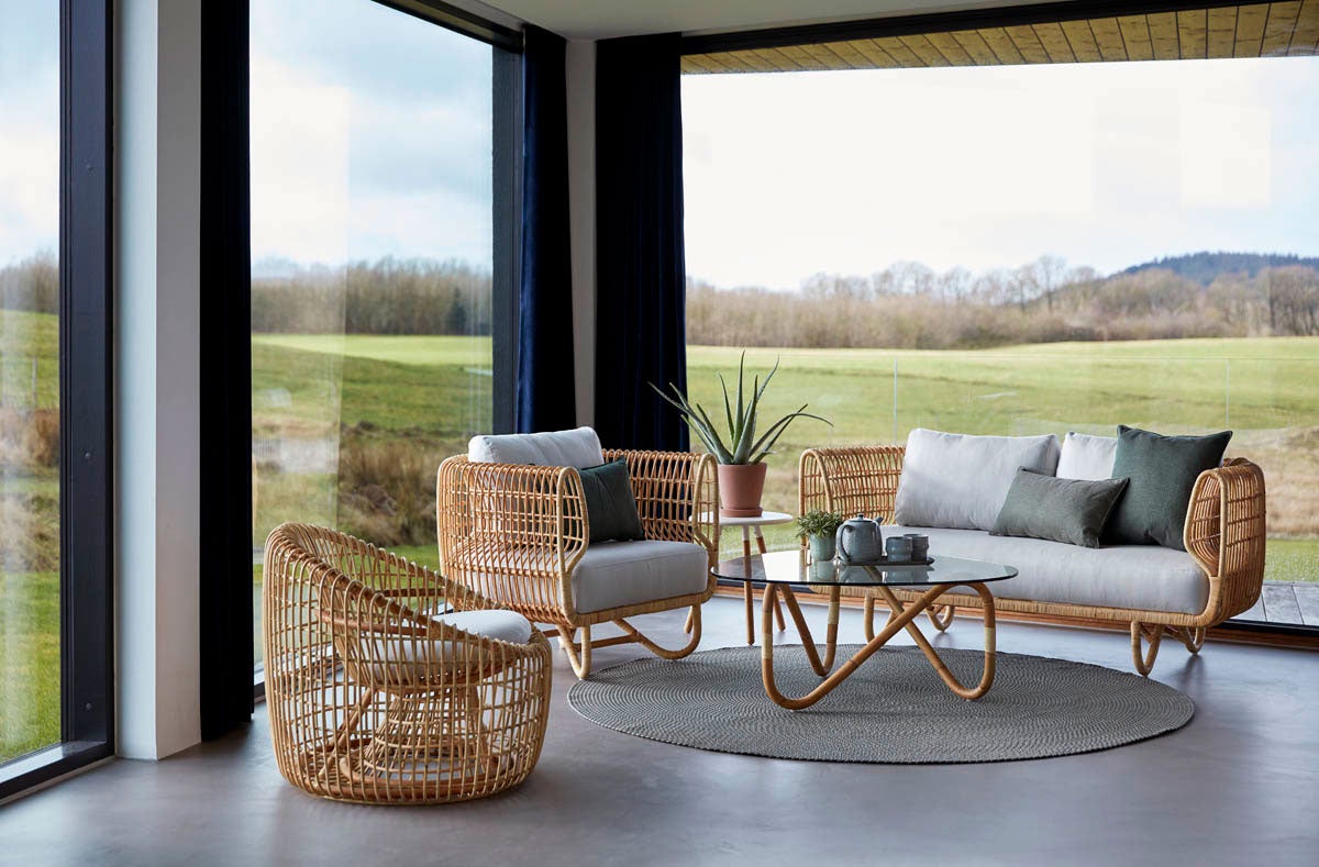 Nest loungechair and sofa in natural rattan with white fabric from Cane-line