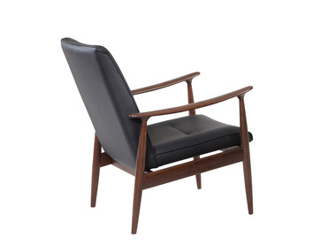 Legend Fåtölj i svartläder och valnötsbets, sida.