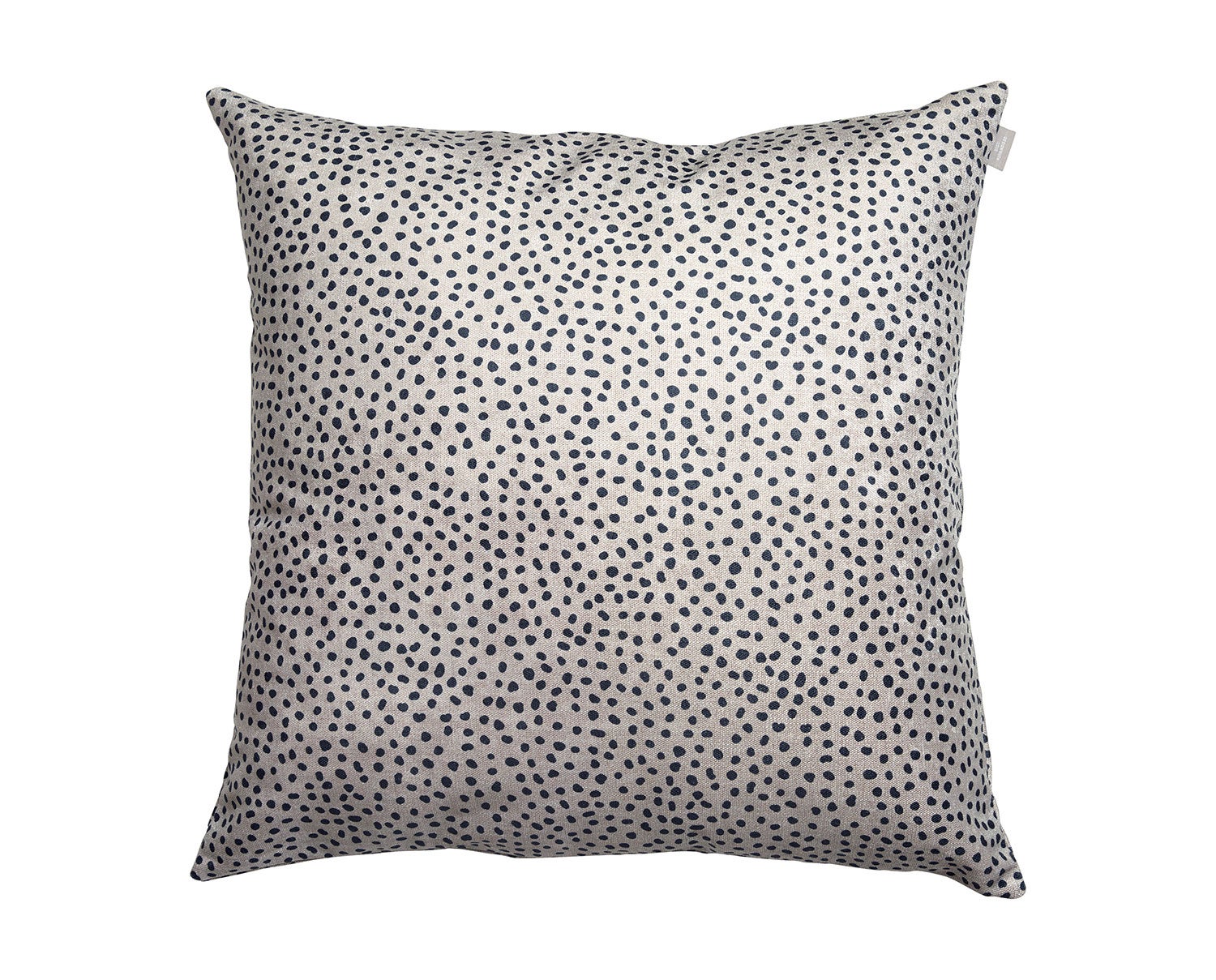 Dotty prydnadskudde i färgen beige