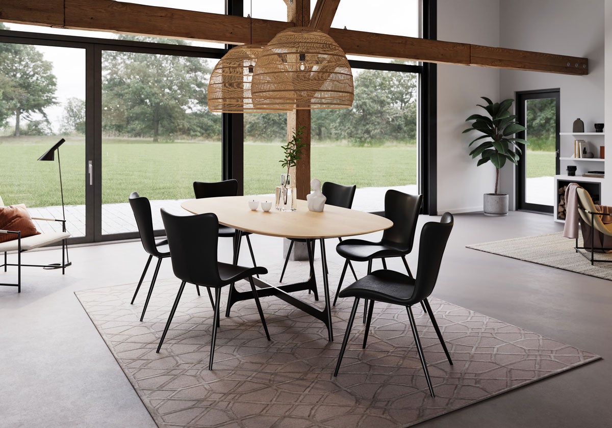 Matbordet Ooid i oval form, stående i vardagsrumsmiljö