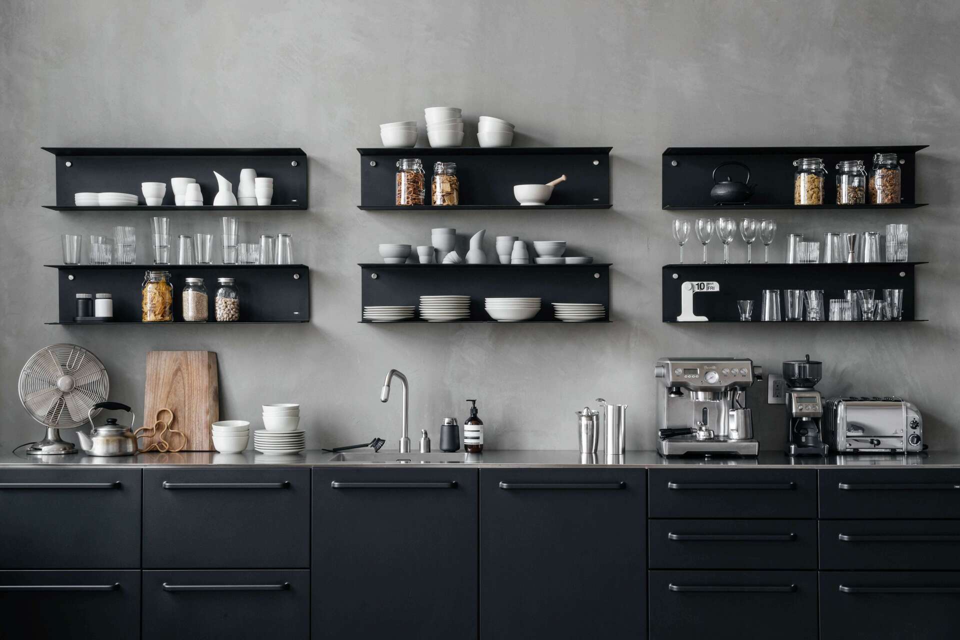 Vipp shelves black in Soho kitchen