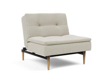 Dublexo fåtölj med ljusa stylettoben i tyget 527 Mixed Dance Natural