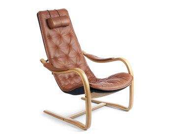 Conform Bravo fåtölj med svikt i färgen Cognac.