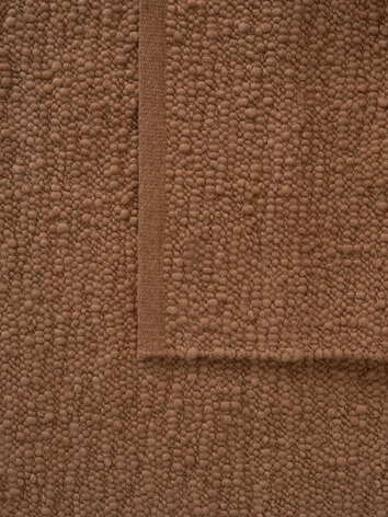 Struktur på Pebbled Poem Matta i färgen Terracotta