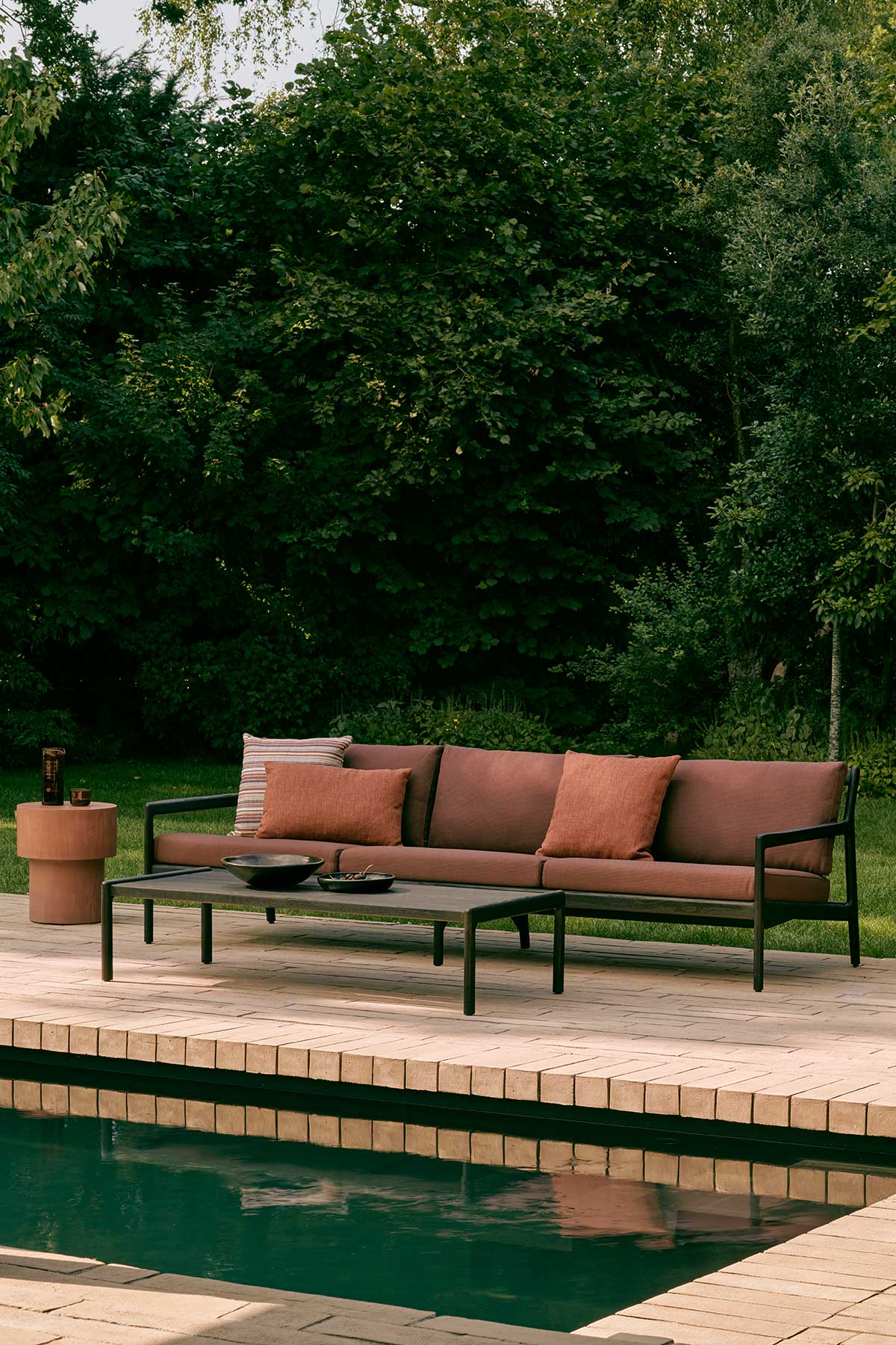 Ethnicraft-Jack-Outdoor-Sofa-3S-Black-Teak-Burgundy-Lifestyle